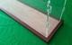 29L x 11W x 7H display case with 3/16 thick acrylic brown wood frame base