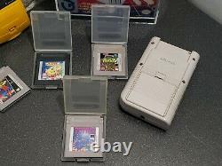 Lot of 4 Nintendo GameBoy Console Systems, games, 1 Factory Box and display case