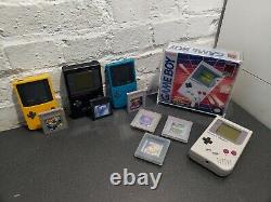 Lot of 4 Nintendo GameBoy Console Systems, games, 1 Factory Box and display case
