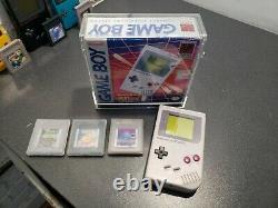 Lot of 4 Nintendo GameBoy Console Systems, games, 1 Factory Box and display case