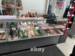 Multiple Lighted Glass Display Cases withShelves Various Sizes And Styles