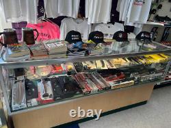 Multiple Lighted Glass Display Cases withShelves Various Sizes And Styles