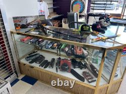 Multiple Lighted Glass Display Cases withShelves Various Sizes And Styles