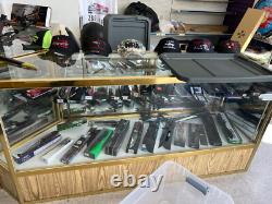Multiple Lighted Glass Display Cases withShelves Various Sizes And Styles