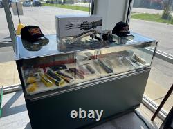 Multiple Lighted Glass Display Cases withShelves Various Sizes And Styles