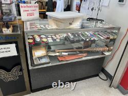 Multiple Lighted Glass Display Cases withShelves Various Sizes And Styles