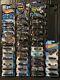 Unopened 20-yr. Span mix lot of 73 variant Hot Wheels Batmobiles & display cases